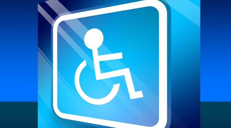 znaczek - osoba na wózku inwalidzkim